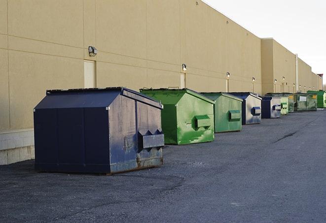 a row of industrial dumpsters for construction waste in Basehor